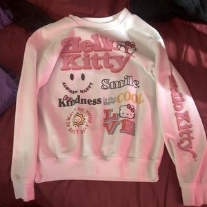 Hello Kitty sweater with ‘Hello Kitty’ on the sleeve